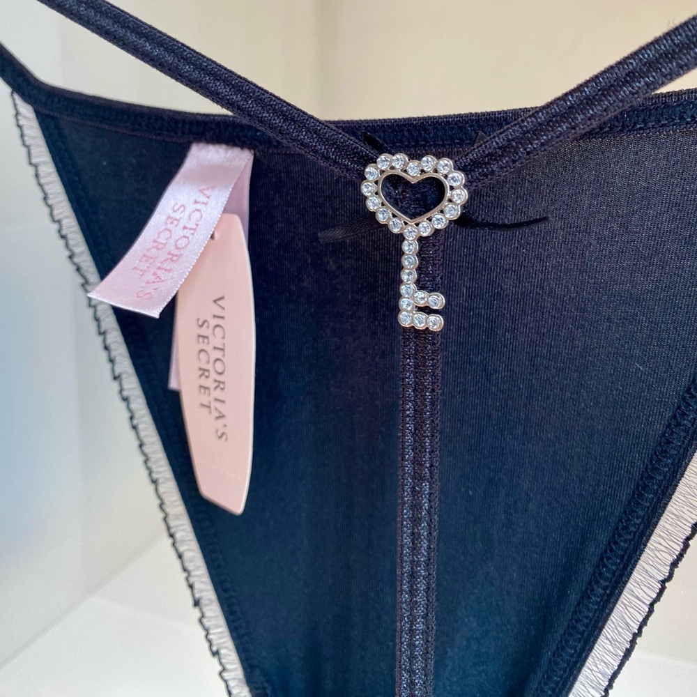 Victoria's Secret Black Thong with rhinstone Key Charm. Very nice !